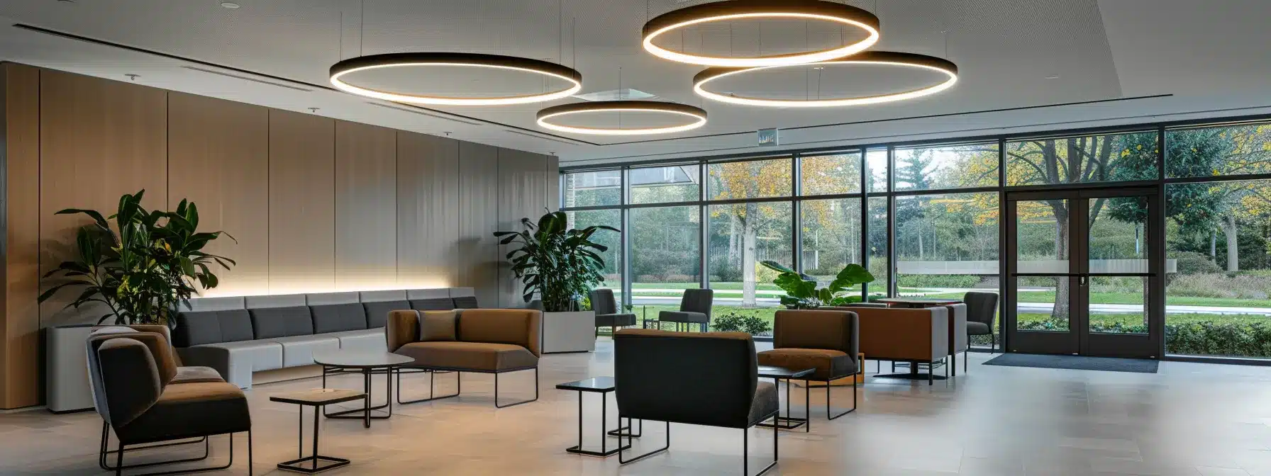 a modern alzheimer care facility in michigan, featuring a spacious, well-equipped common area with soft, ambient lighting, comfortable seating arrangements, and thoughtful decor designed to promote safety and tranquility for residents. a modern alzheimer care facility in michigan, featuring a spacious, well-equipped common area with soft, ambient lighting, comfortable seating arrangements, and thoughtful decor designed to promote safety and tranquility for residents.